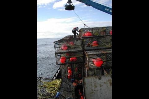 Loading king crab pots. Credit: NOAA
